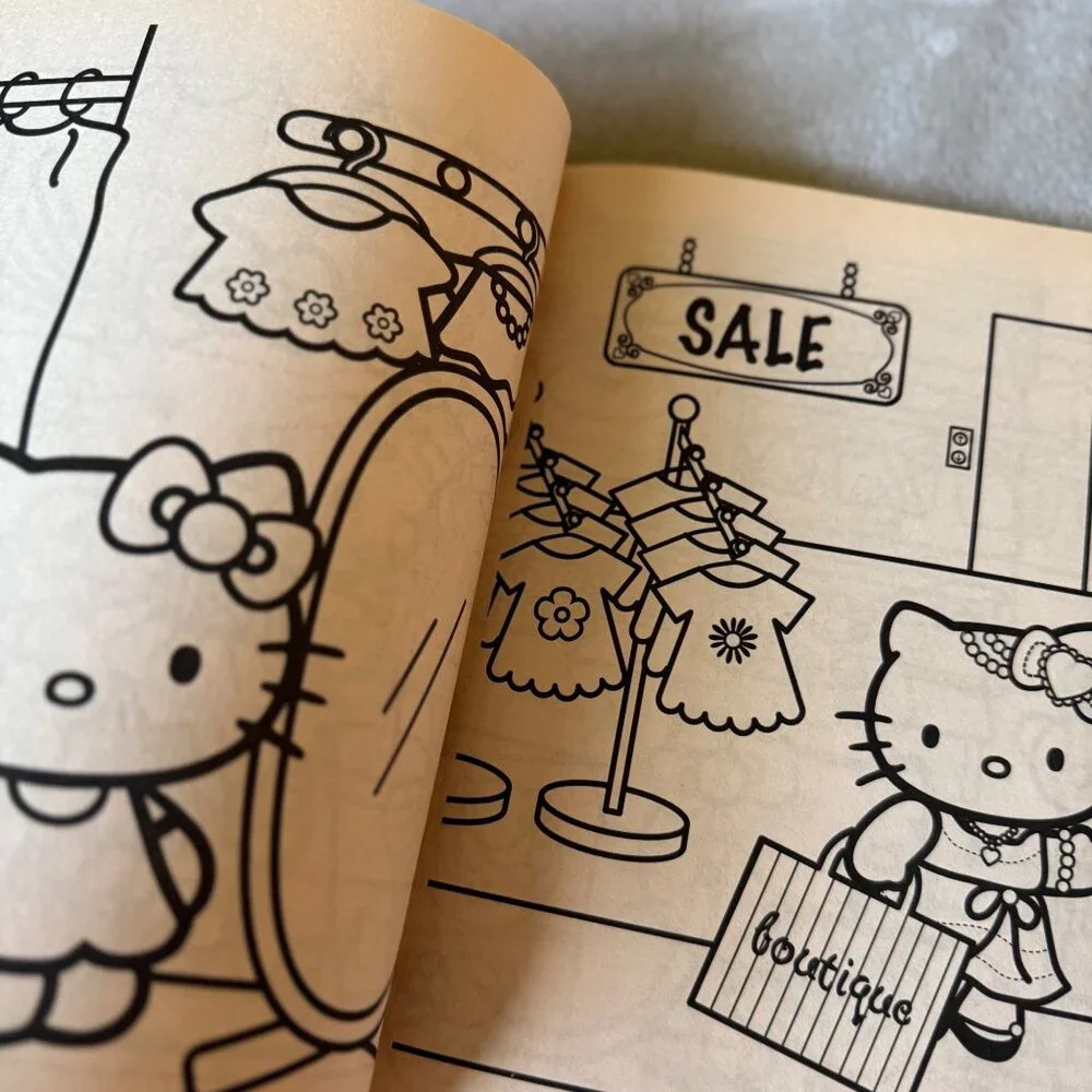 2009 New‎ NOS Sanrio Hello Kitty coloring activity book/paper doll